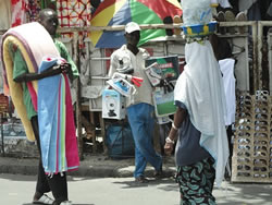 Photo of workers carrying goods.