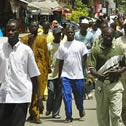 Photo of Senegalese walking down a public street.